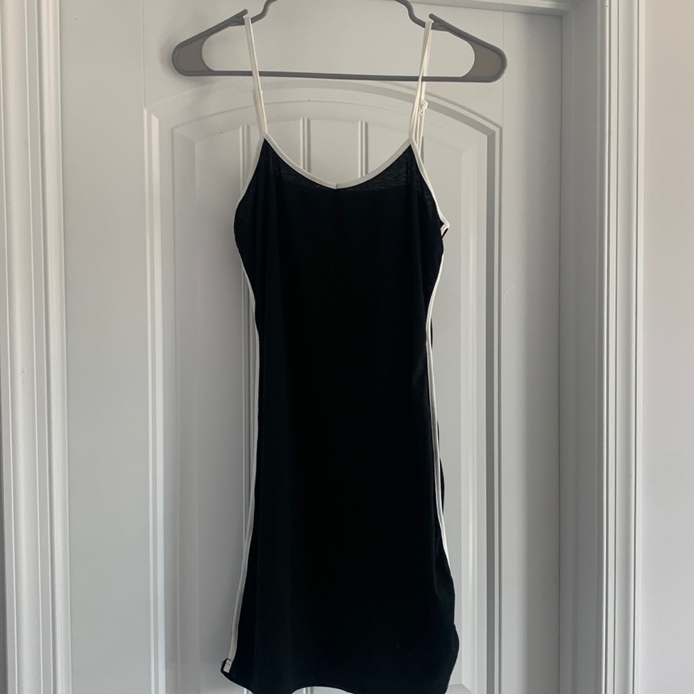 90’s style black and white trimmed mini dress. Size L.